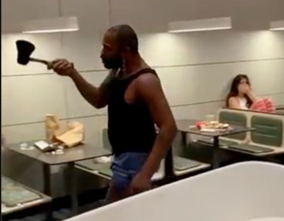 Man Gets Jumped, Brings Out Hatchet & Causes Terror In McDonald’s!