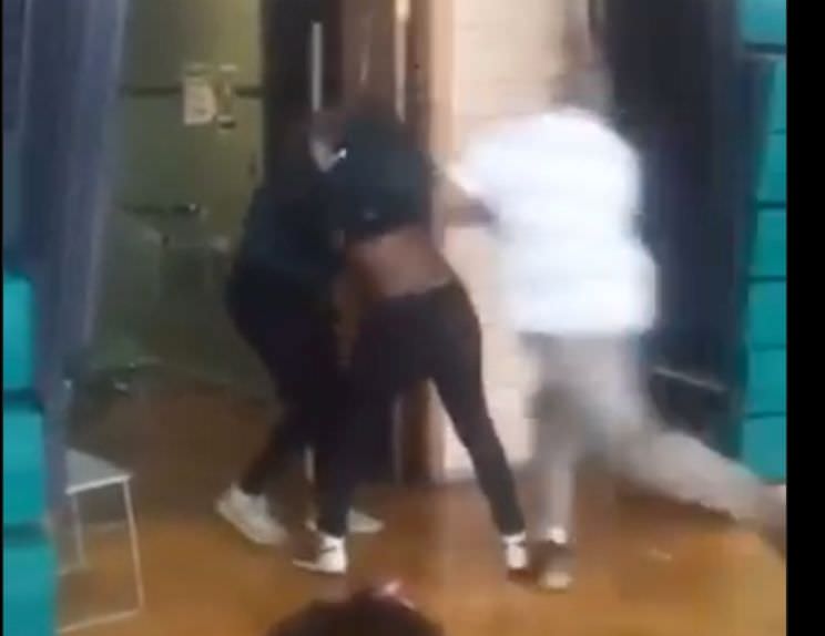 DAMN: Teacher Tackles The Beef Out Of 2 High School Girls Fighting In School!